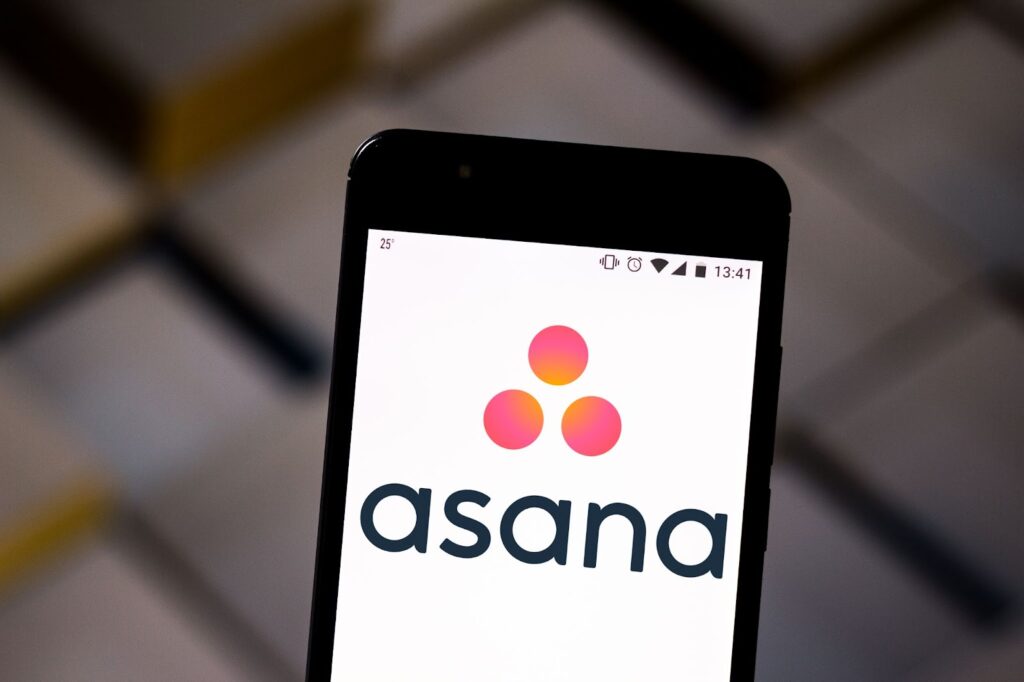 asana logo on cellphone screen